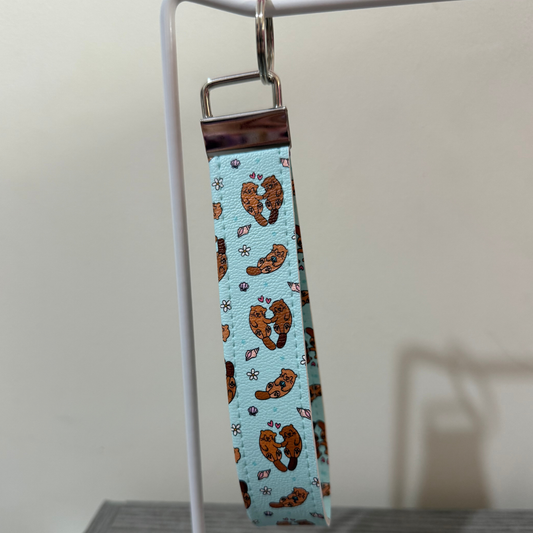 Cute Blue Otter Leather Keychain Wristlet